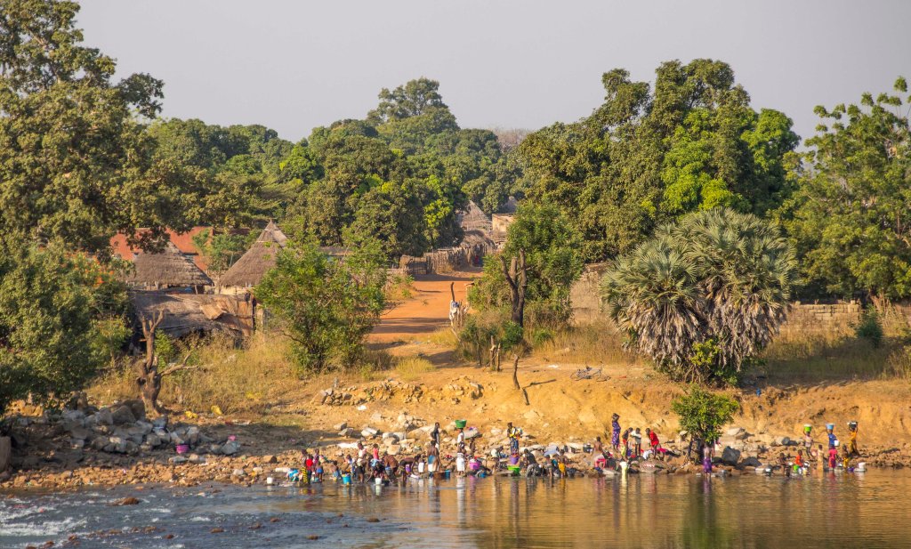 Washing on river Gambia bank