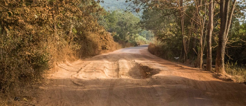 Potholes on the national road - thankfully in the dry season